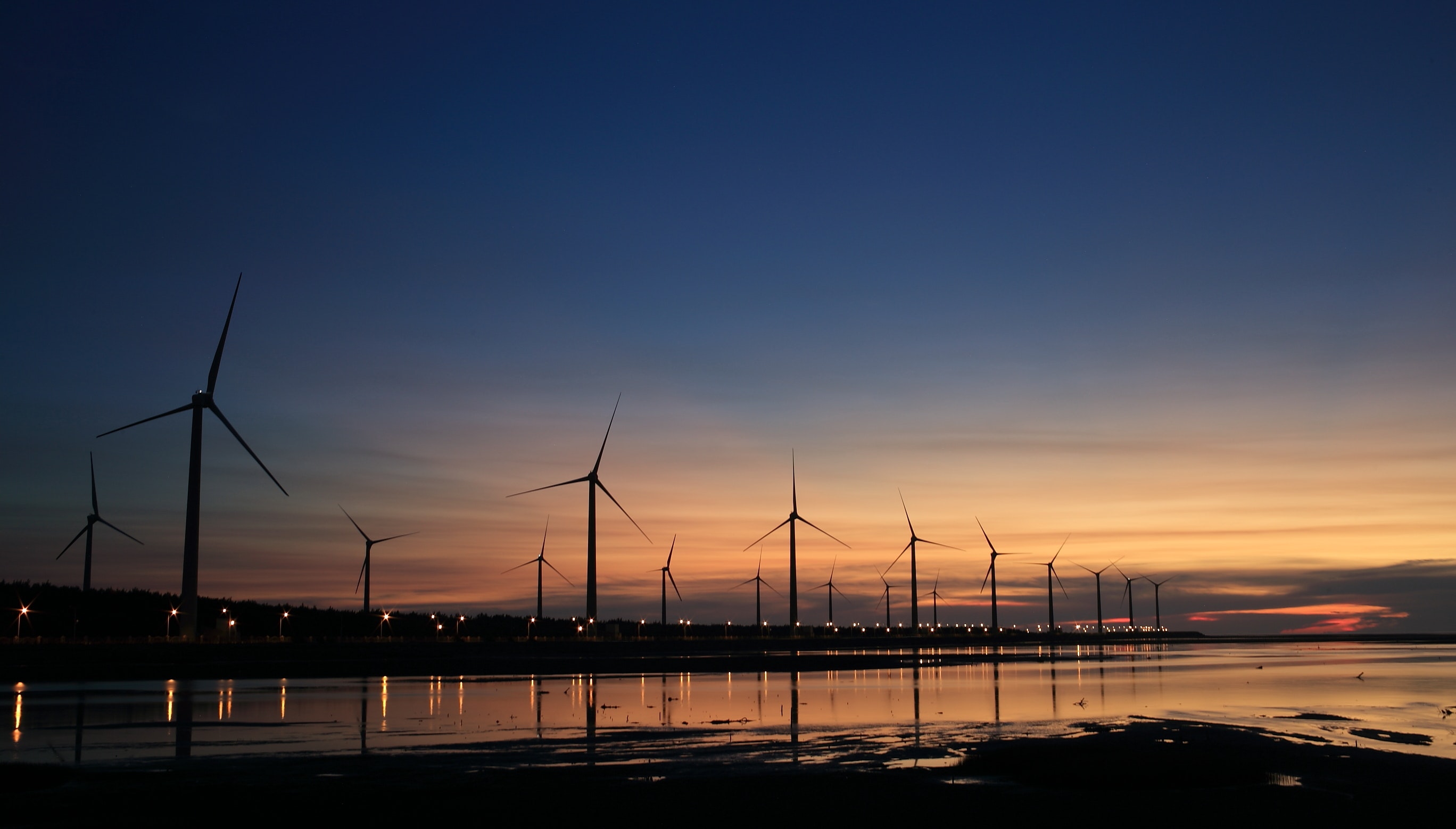 sunset wind turbines